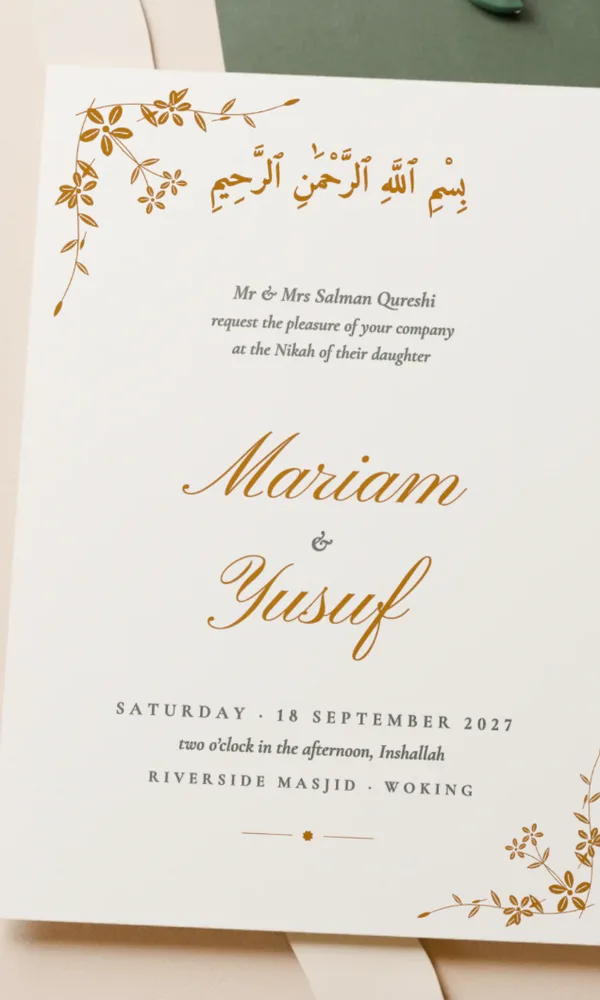 The Ivory Card as Jasmine: sprays of jasmine in gold at two corners, the names in script
